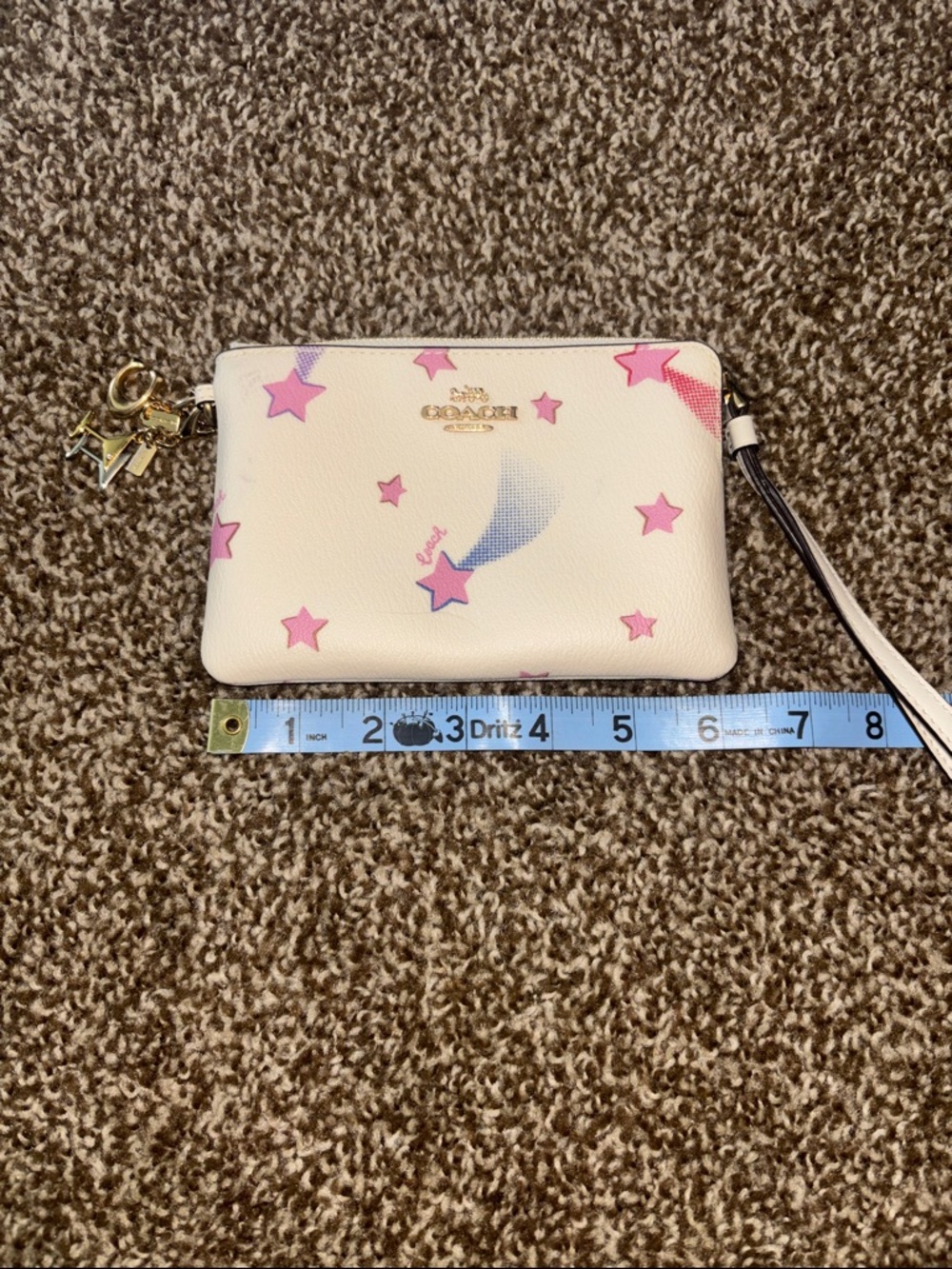 Coach Cream Wristlet with Pink Star Motif